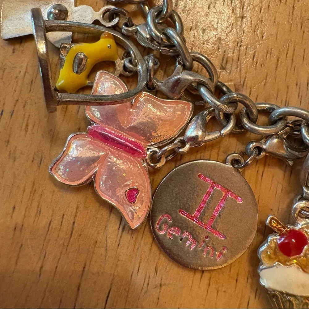 Claires silver charm
